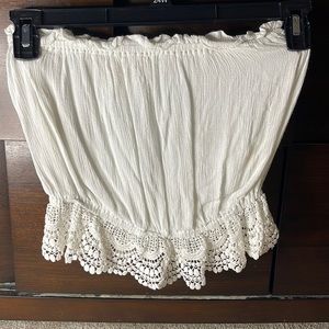 White crochet bottom crop top from Discovery Clothing Company